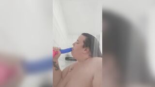 Sucking dildo in shower