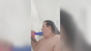 Sucking dildo in shower